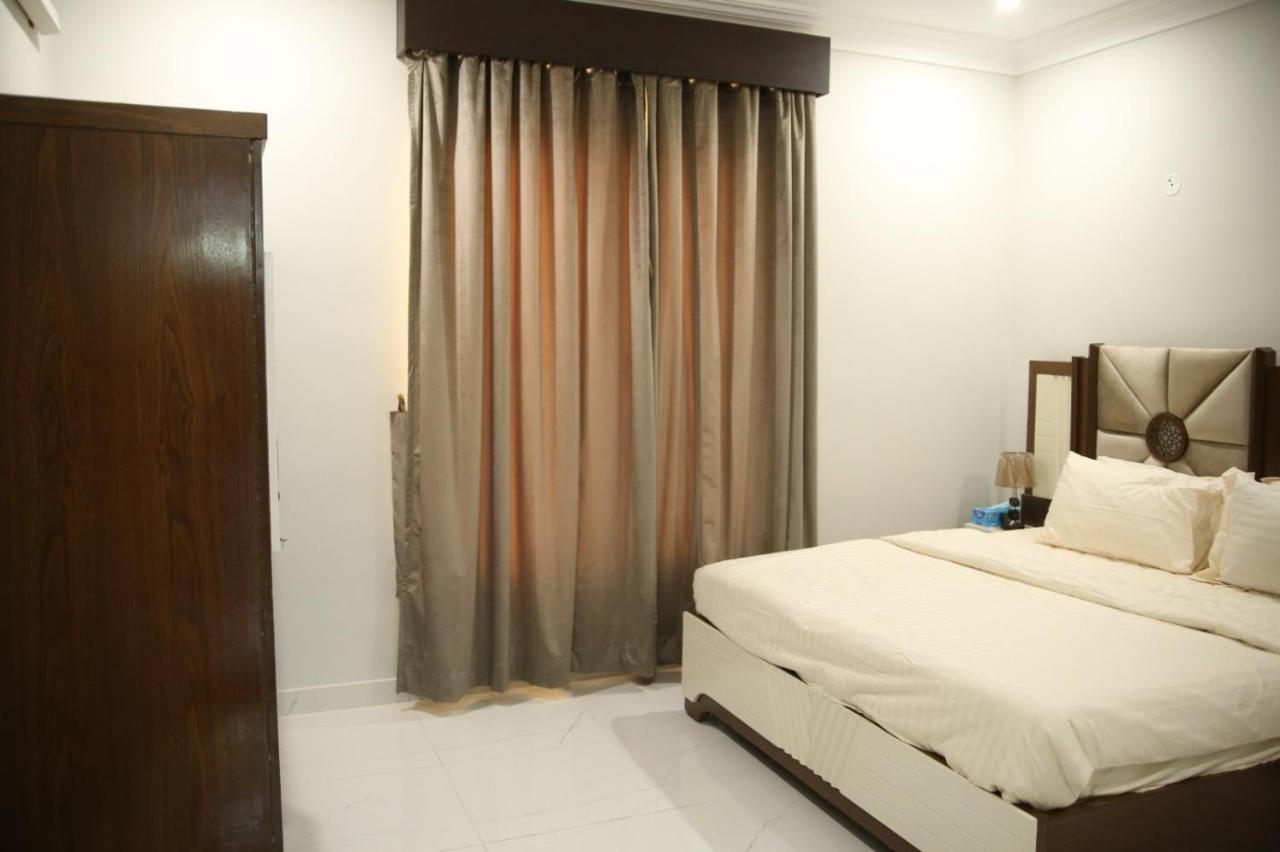 Al Rasheed Apartments Second Floor Apartment Karatschi Exterior foto