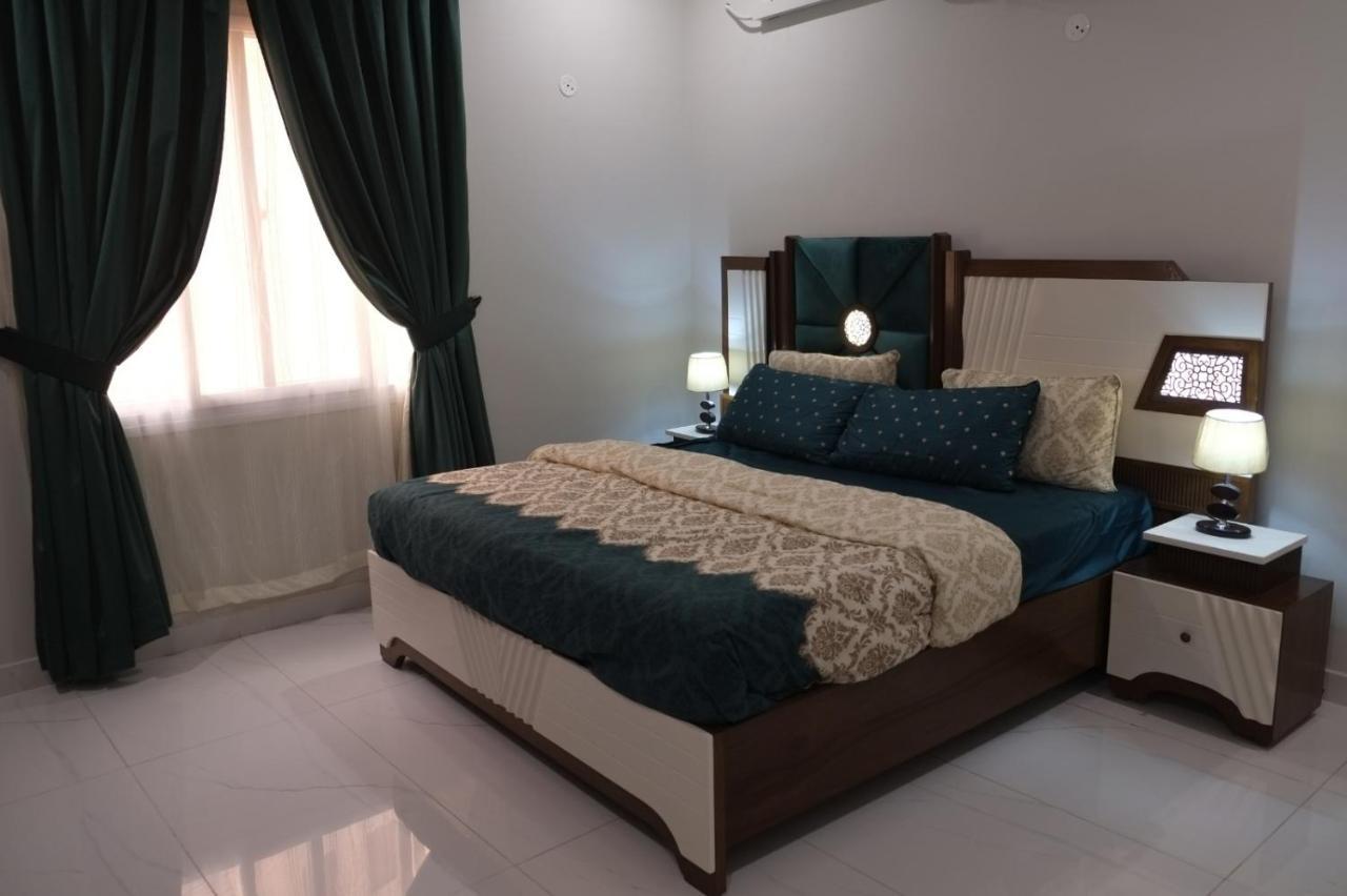 Al Rasheed Apartments Second Floor Apartment Karatschi Exterior foto